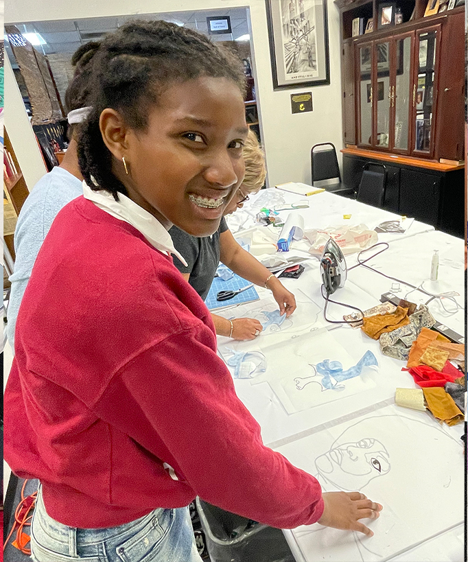 Sundai working with textiles